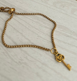 Gold Push Up Charm Bracelet